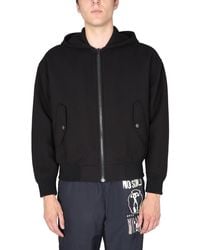 Moschino - Hooded Jacket With Bold Logo Print - Lyst