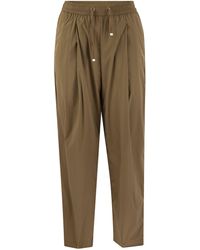 Herno - Pantalones de nylon de estiramiento de - Lyst