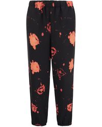 Marni - Trousers With Faded Roses Print - Lyst