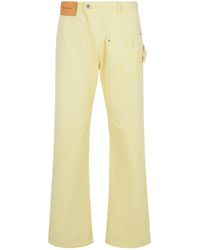 JW Anderson - JW Anderson Workwear 'Pantalones de algodón con pierna torcida amarilla - Lyst