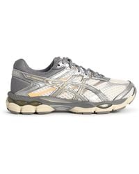 Asics - Baskets «Cumulus» en tissu technique crème et gris - Lyst