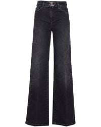Liu Jo - Flared Jeans Met Logoplakkaat - Lyst