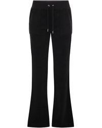 Juicy Couture - Pantaloni di velluto in cotone succoso couture - Lyst