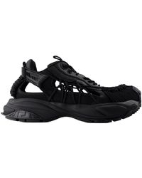 Versace - Turnschuhe Leder schwarz - Lyst