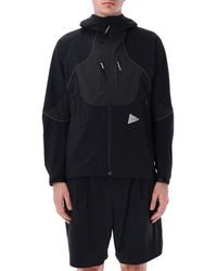 and wander - Und Wander Coats Schwarz - Lyst