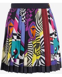 Versace - Mini-jupe plissée en sergé de soie - Lyst