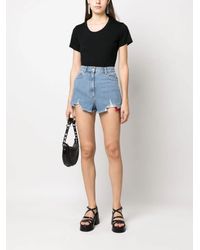 Moschino - Pantaloni dei jeans Moschino - Lyst