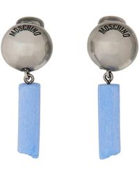 Moschino - Boucles d'oreilles de logo - Lyst