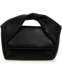 JW Anderson - J.W.VERSON 'TWISTER MIDI' Handtasche - Lyst