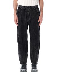 and wander - Textured Trousers - Lyst
