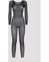 Wolford - Jumpsuits - Lyst