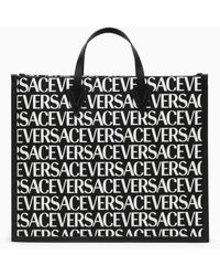 Versace - Black Tote Bag Mit Dem Ganzen Logo - Lyst
