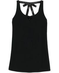 Prada - Minivestido con logo triangular de - Lyst