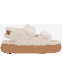 Moon Boot - Shearling-Sandalen mit dicker Sohle - Lyst