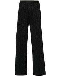 Palm Angels - Knitted Flared Trousers - Lyst