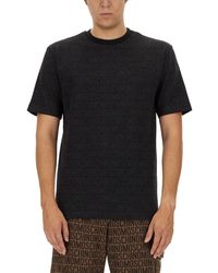 Moschino - All-Over Logo Print T-Shirt - Lyst
