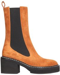 KHAITE - Calgary Boots - Lyst