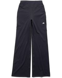 Balenciaga - Pantaloni activewear flared slim fit - Lyst