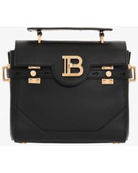 Balmain Small B-buzz 23 Smooth Leather Top Handle Bag With Logo Plaque - Black