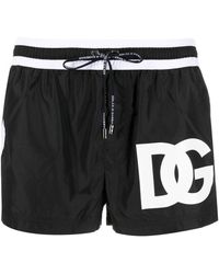 Save 76% Dolce & Gabbana Logo-print Drawstring Swim Trunks in Black for Men Mens Clothing Beachwear 