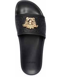 Versace Flip-flops and slides for Women - Up to 50% off at Lyst.com