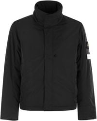 Stone Island - Padded Jacket With Anti-Drip And Zipped Pockets - Lyst