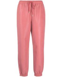 Stella McCartney - Faux-leather Tapered Trousers - Lyst