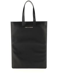 comme des garçons tote bag