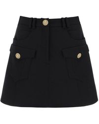 Balmain - Trapeze Mini Skirt With Embossed Buttons - Lyst