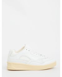 cream leather trainers