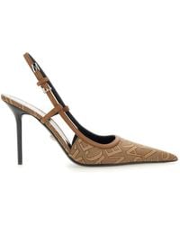 Versace - Pumps With Allover Logo - Lyst