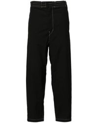Lemaire - Cotton Belted Carrot Trousers - Lyst