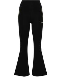 Versace - Flared Leggings With Appliqué - Lyst