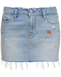 ERL - Light Blue Mini-skirt With Logo Patch And Raw Edge In Cotton Denim X Levi's - Lyst