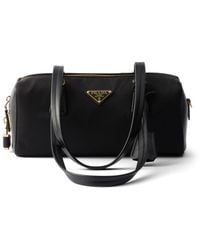 Prada - Re-Nylon And Leather Medium Top-Handle Bag With Padlock - Lyst