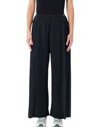 Nike - Flowing Pleated Wide-Leg Pants - Lyst