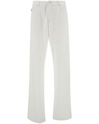 Versace - White Five-pocket Jeans With Logo Patch In Cotton Denim Man - Lyst