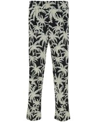 Palm Angels - Black And White Pants With All-over Palm Print In Tech Fabric Man - Lyst