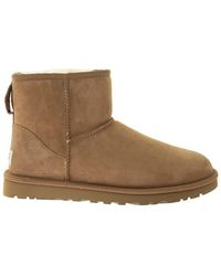 UGG Classic Mini Boots for Men - Up to 49% off | Lyst