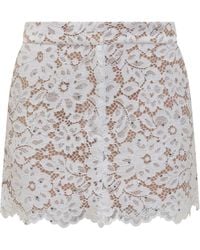 Michael Kors Mini Skirt With Floral Appliqués in White | Lyst