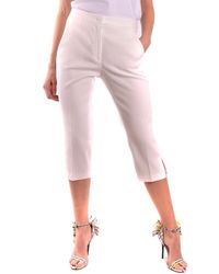 Womens Clothing Trousers Love Moschino Heart Shaped Back Pocket Skinny Trouser in White Slacks and Chinos Full-length trousers 