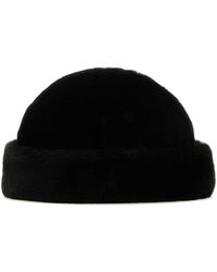 Prada - Logo Plaque Shearling Hat - Lyst