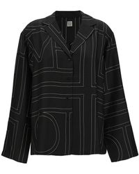 Totême - Shirt With All-over Monogram Print In Silk Woman - Lyst