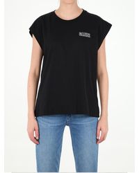 Ganni T-shirts for Women - Up to 74% off | Lyst