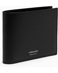 Ferragamo - Black Leather Bi Fold Wallet With Logo - Lyst