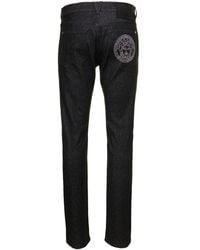 Versace - Black Straight Jeans With Studded Medusa In Stretch Cotton Denim Man - Lyst