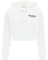 Balmain - Cropped Hoodie With Flocked Logo - Lyst