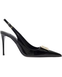 Dolce & Gabbana - Black Slingback Pumps With Metal Dg Patch In Shiny Leather Woman - Lyst