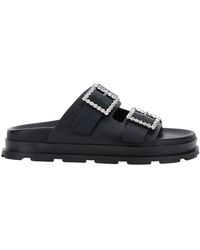 Pollini - Black Sandals With Rhinestone Buckle In Hammered Leather Woman - Lyst