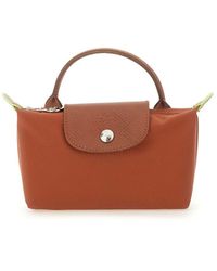 Longchamp - "Le Pliage" Clutch Bag With Handle - Lyst